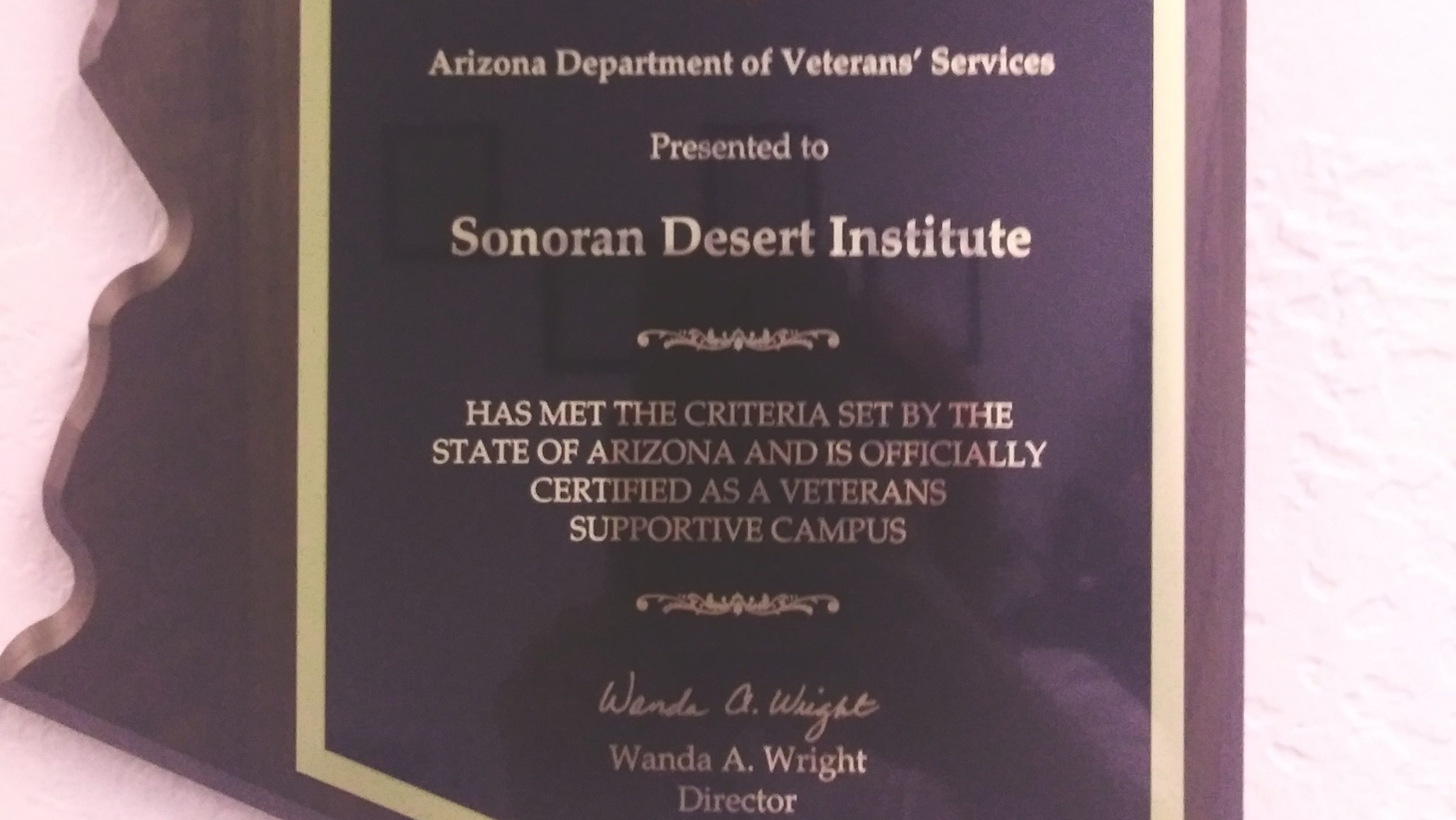 Image of a plaque recognizing SDIs accomplishments as a supportive campus for veterans