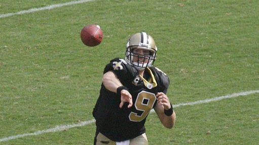 A football player throwing a perfect spiral